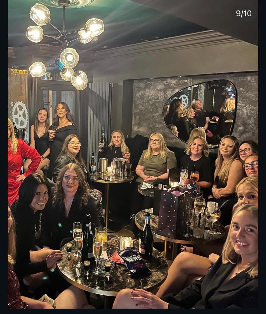 Women celebrating at upscale lounge party