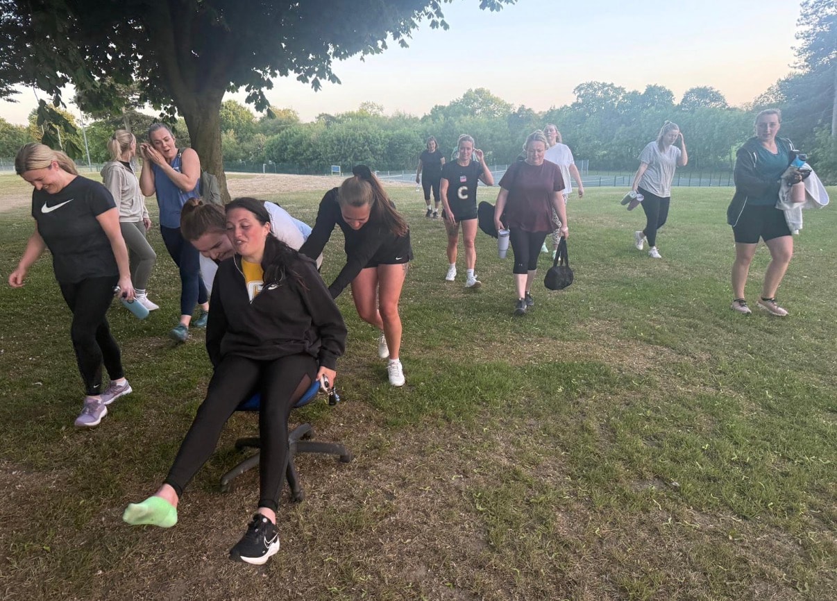 Group of women running outdoor fitness class